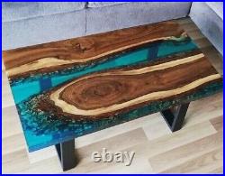 Custom dining table made of walnut wood and blue resin, unique and contemporary